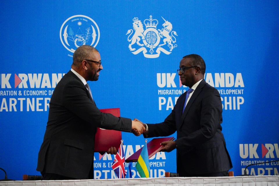 James Cleverly and Rwandan foreign minister Vincent Biruta sign the new treaty (PA Wire)