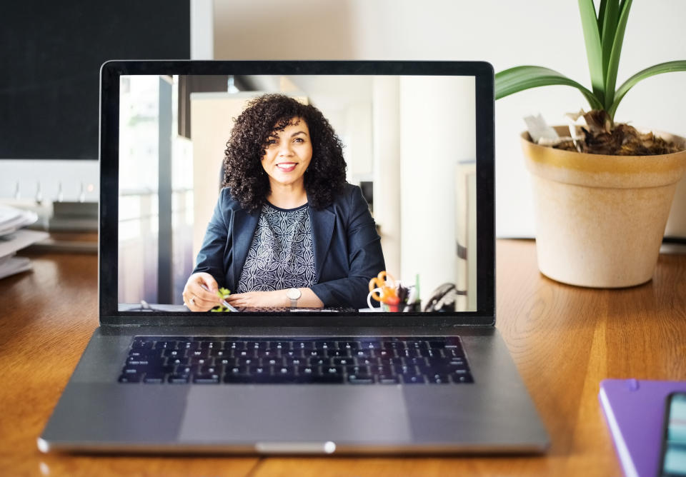 Shot of a mid adult businesswoman having a video call on a laptop