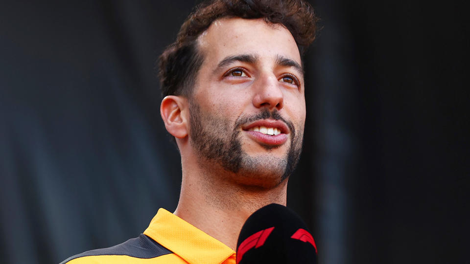 Daniel Ricciardo is pictured speaking to fans during an event at the United States GP in 2022.