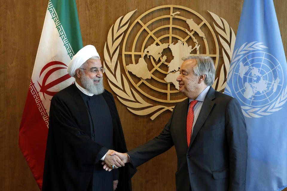 Iranian President Hassan Rouhani, left, meets with United Nations Secretary General Antonio Guterres on the sidelines of the 73rd session of the United Nations General Assembly, at U.N. headquarters, Wednesday, Sept. 26, 2018. (AP Photo/Jason DeCrow)