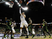 KANSAS CITY, MO - MARCH 10: Michael Dixon #11 of the Missouri Tigers shoots against the Baylor Bears in the first half during the championship game of the 2012 Big 12 Men's Basketball Tournament at Sprint Center on March 10, 2012 in Kansas City, Missouri. (Photo by Jamie Squire/Getty Images)