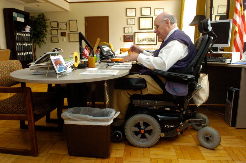 Judge Charles D. Susano Jr. at work in his office on the second floor of the Historic U. S. Post Office and Court House in Knoxville on July 23, 2007. Susano won the Spirit of ADA Award for an individual with a disability.