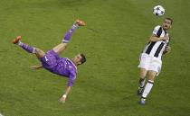 <p>Real Madrid’s Cristiano Ronaldo shoots at goal with a overhead kick </p>