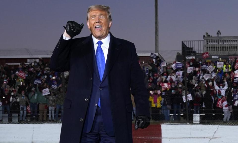 President Donald Trump gestures to supporters after speaking during a campaign rally in Wisconsin.