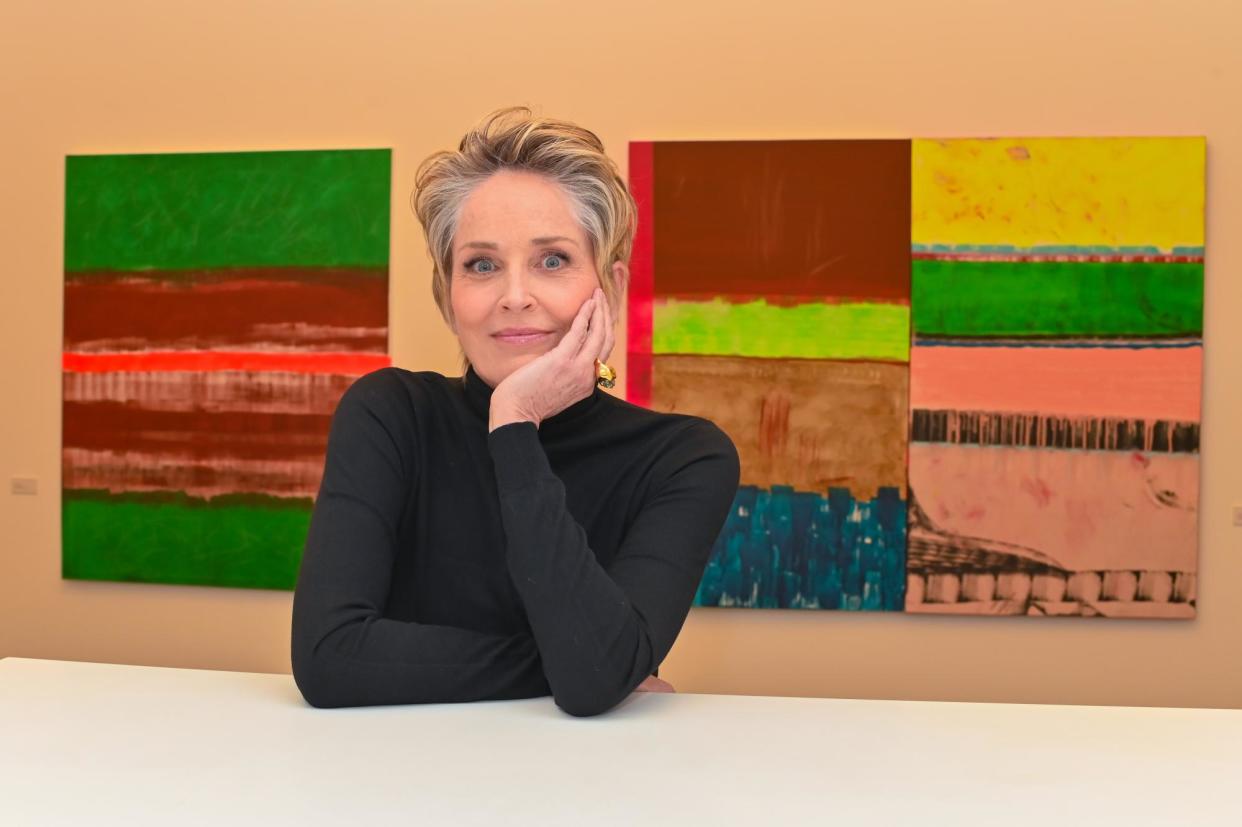 <span>‘Painting was just another language I grew up knowing’ … Sharon Stone at her exhibition in Berlin.</span><span>Photograph: Eva Oertwig/Schroewig</span>