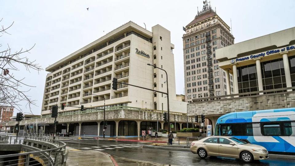 The Radisson Hotel building sits on Van Ness Avenue in downtown Fresno next to the taller Pacific Southwest Building. The City of Fresno shut down the hotel in late December due to code violations. It was announced Wednesday, March 29 that it has new ownership.