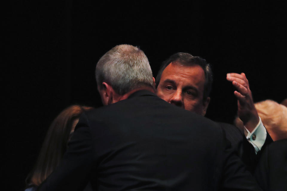 Phil Murphy greets&nbsp;his predecessor, Chris Christie, after taking the oath of office in Trenton on Jan. 16. (Photo: Lucas Jackson / Reuters)