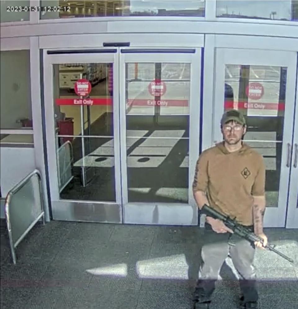In this image taken from security camera footage provided by the Omaha, Neb., Police Department, a man identified by police as Joseph Jones, armed with an AR-15-style rifle, is seen at a Target store in Omaha on Tuesday, Jan. 31, 2023, before police fatally shot him. On Wednesday, Feb. 1, police said that Jones obtained the weapon just four day earlier at a Cabela’s sporting goods store. (Omaha Police Department via AP)