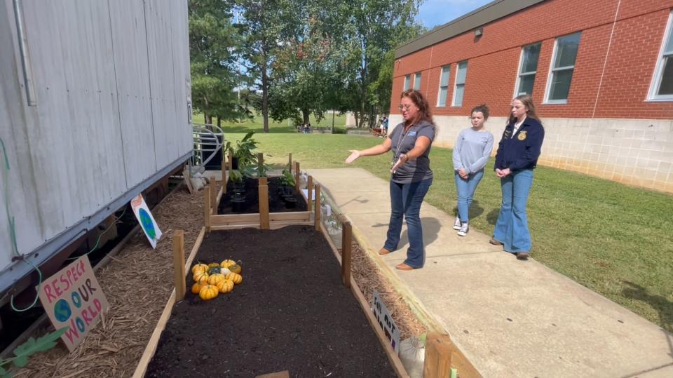 Moats-Platt uses the school dirt her students produce in an on-campus fruit and vegetable garden.