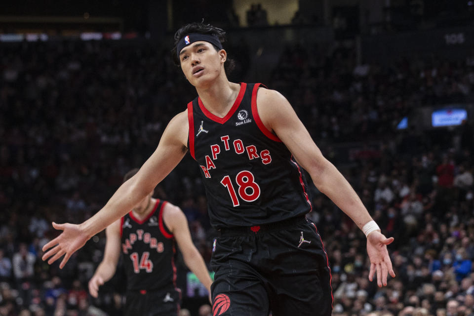 Toronto Raptors' Yuta Watanabe celebrates after scoring against the Milwaukee Bucks during the first half of an NBA basketball game Thursday, Dec. 2, 2021, in Toronto. (Chris Young/The Canadian Press via AP)