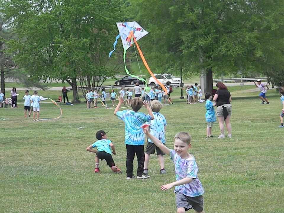 Linden Elementary School students fly kites at A.K. Bissell Park.