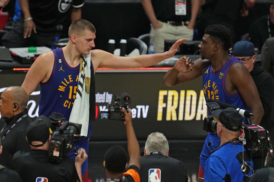 Denver Nuggets center Nikola Jokic (15) reacts after a 109-94 victory against the Miami Heat.