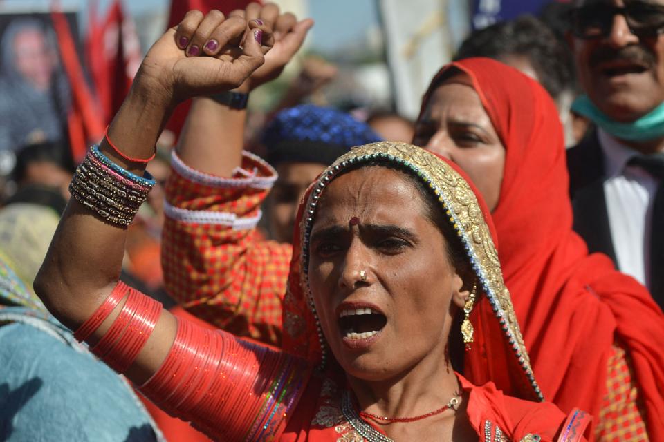 Women yell slogans during an International Women's Day rally in Karachi in PakistanAFP via Getty Images