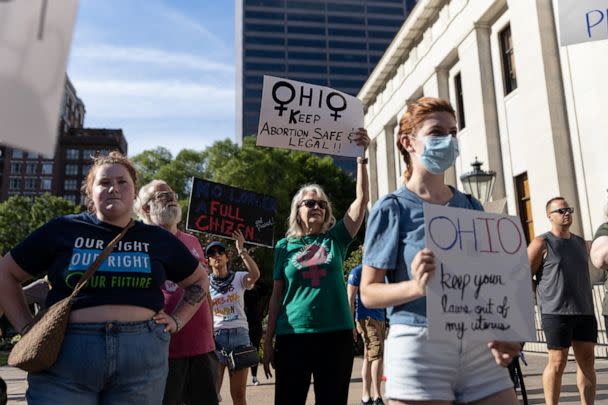 PHOTO: In this June 24, 2022, file photo, abortion rights protesters hold signs at a rally in Columbus, Ohio. (Megan Jelinger/Reuters, FILE)