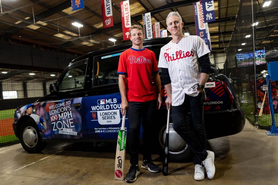 Jos Buttler and Chase Utley try out each other’s sports at an MLB and cricket event (Juan Gasparini)