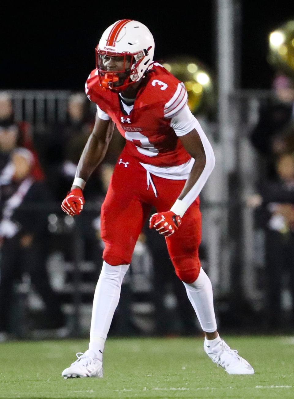 Smyrna's Corey M. Williams exalts in an open-field tackle in the first half of Smyrna's 48-16 home win against Appoquinimink, Friday, Sept. 29, 2023.