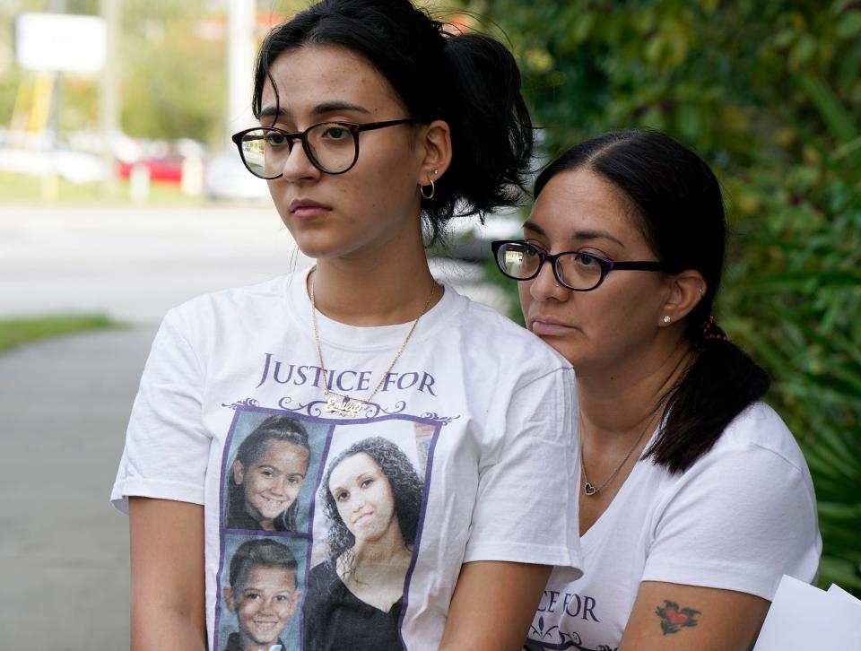 Emily Andino with her mom, Elaine Melendez, gather to remember Yessenia Suarez and her two children, Thalia Otto, 9, and Michael Elijah Otto, 8, on the 10th anniversary of their murders in Deltona, Monday, Oct. 23, 2023.
