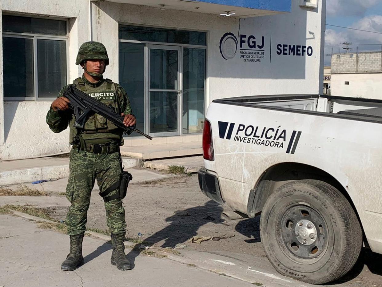 Mexican army soldier guards state prosecutor's office