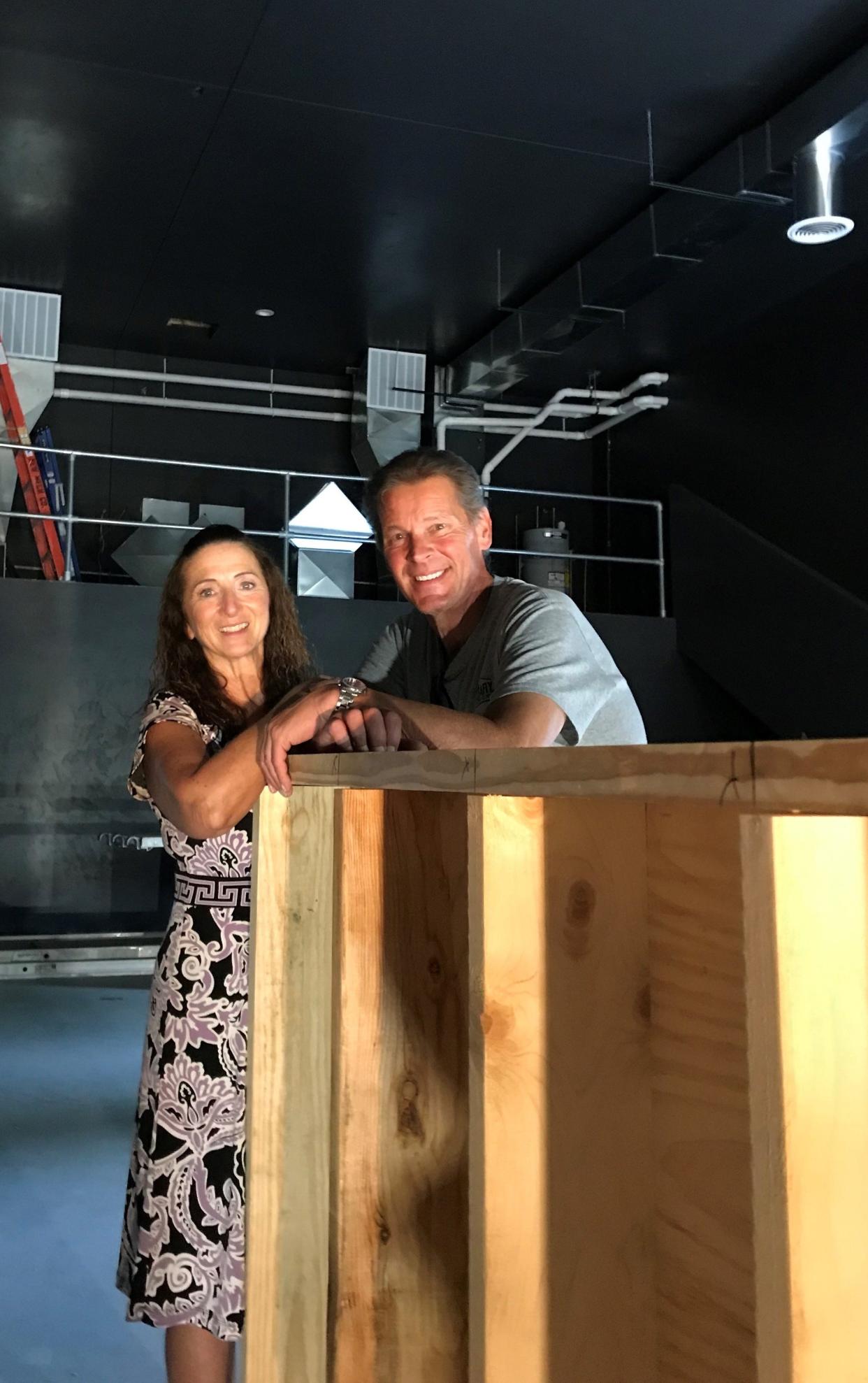 Rogue Theater co-artistic directors Lola DeVillers and Stuart Champeau, seen in their new DC Arts Center in Sturgeon Bay as it was nearing completion, have six productions on their just-announced 2024 season.