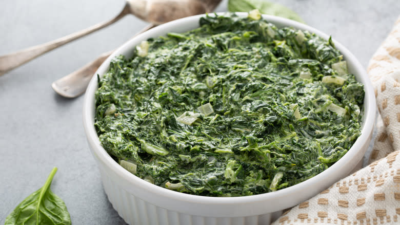 Creamed spinach in white dish 