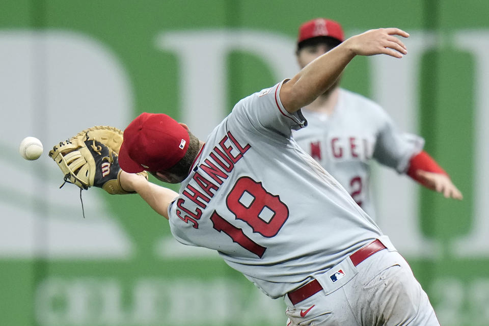 Los Angeles Angels first baseman Nolan Schanuel can't hang onto a pop foul by Tampa Bay Rays' Harold Ramirez during the first inning of a baseball game Wednesday, Sept. 20, 2023, in St. Petersburg, Fla. (AP Photo/Chris O'Meara)