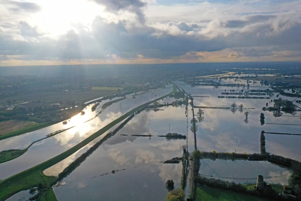 The flood water at Fishlake, in Doncaster, South Yorkshire, as parts of England endured a month's worth of rain in 24 hours, with scores of people rescued or forced to evacuate their homes.