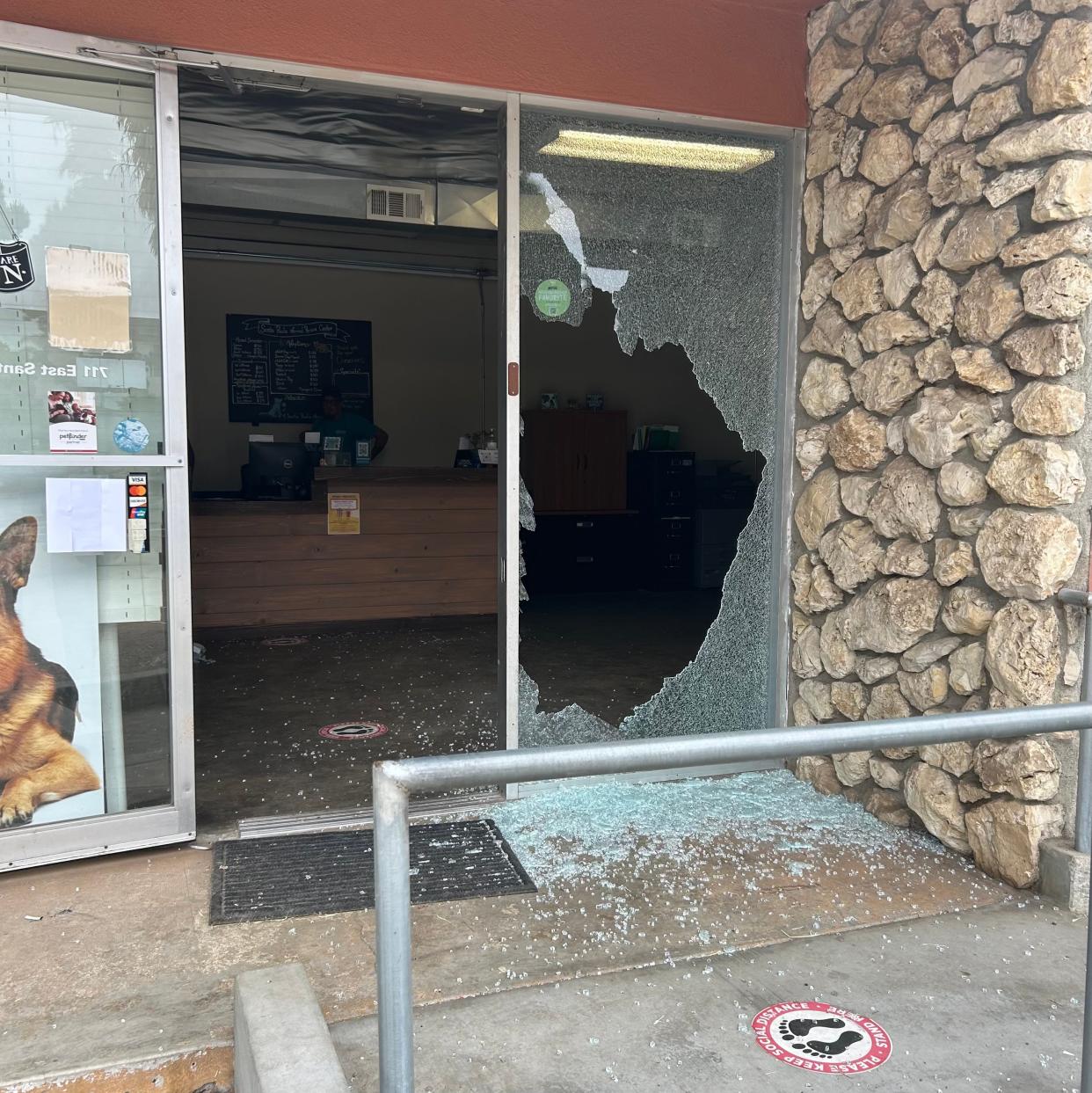 The shattered front window at the Santa Paula Animal Rescue Center May 23 after thieves reportedly broke in and took money from a donation box.