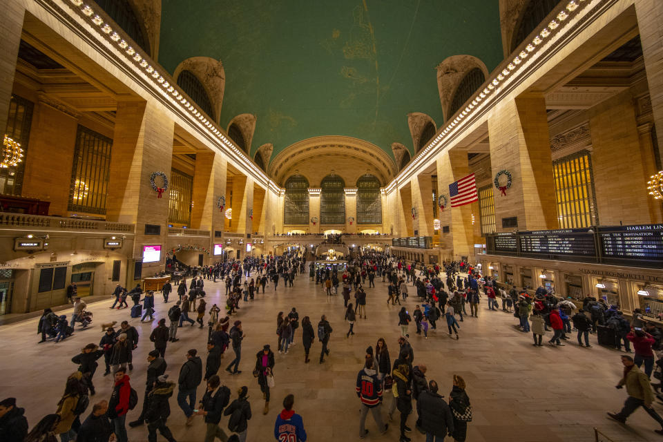 Christmas wreaths adorn the walls of Grand Central Terminal. (Photo: Gordon Donovan/Yahoo News)