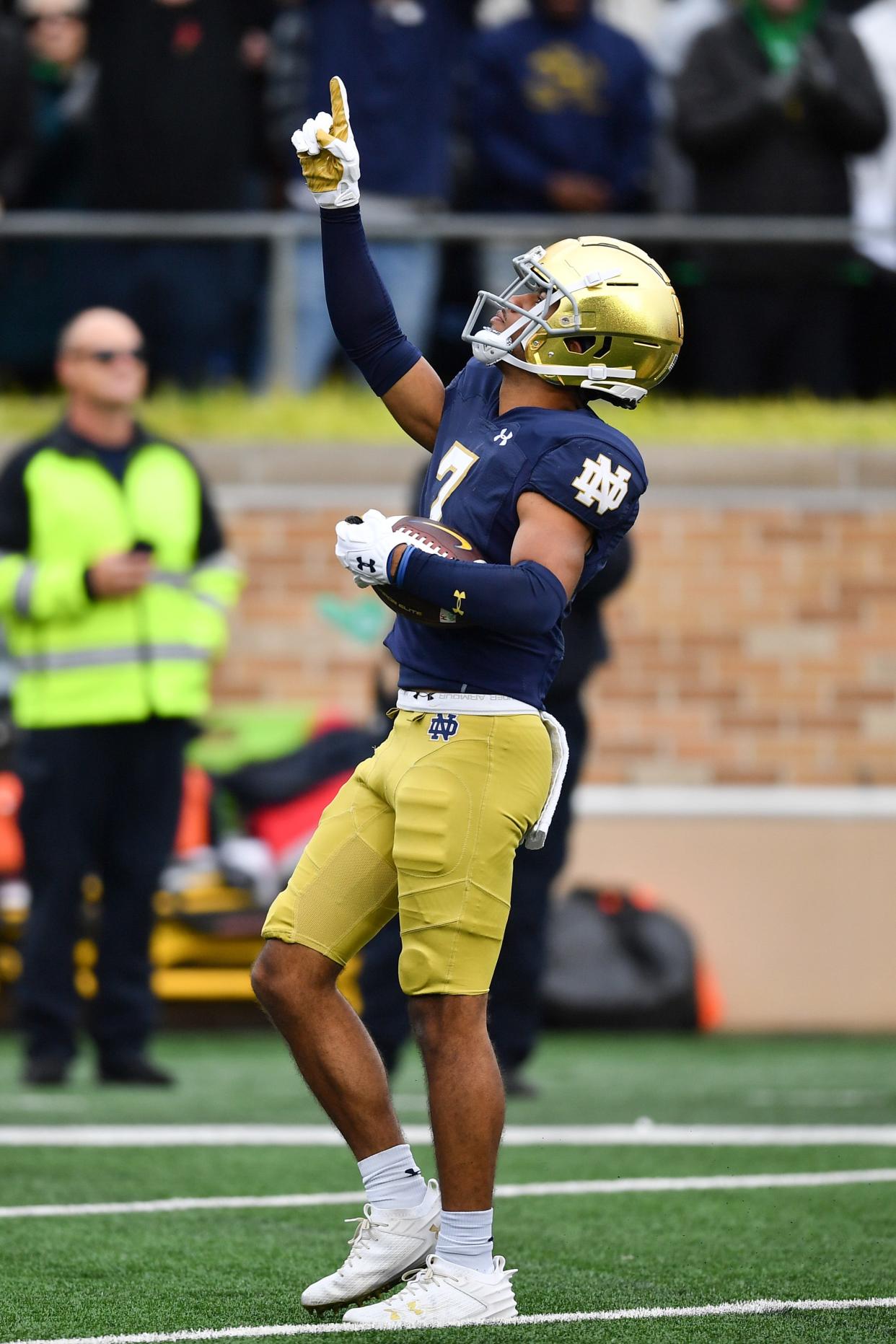 Oct 28, 2023; South Bend, Indiana, USA; Notre Dame Fighting Irish cornerback Jaden Mickey (7) celebrates after returning an interception for a touchdown against the Pittsburgh Panthers in the third quarter at Notre Dame Stadium. Mandatory Credit: Matt Cashore-USA TODAY Sports