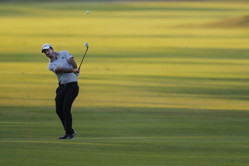 Nick Taylor hits from the ninth fairway during the second round of the Sony Open golf tournament Friday, Jan. 15, 2021, at Waialae Country Club in Honolulu. (AP Photo/Jamm Aquino)