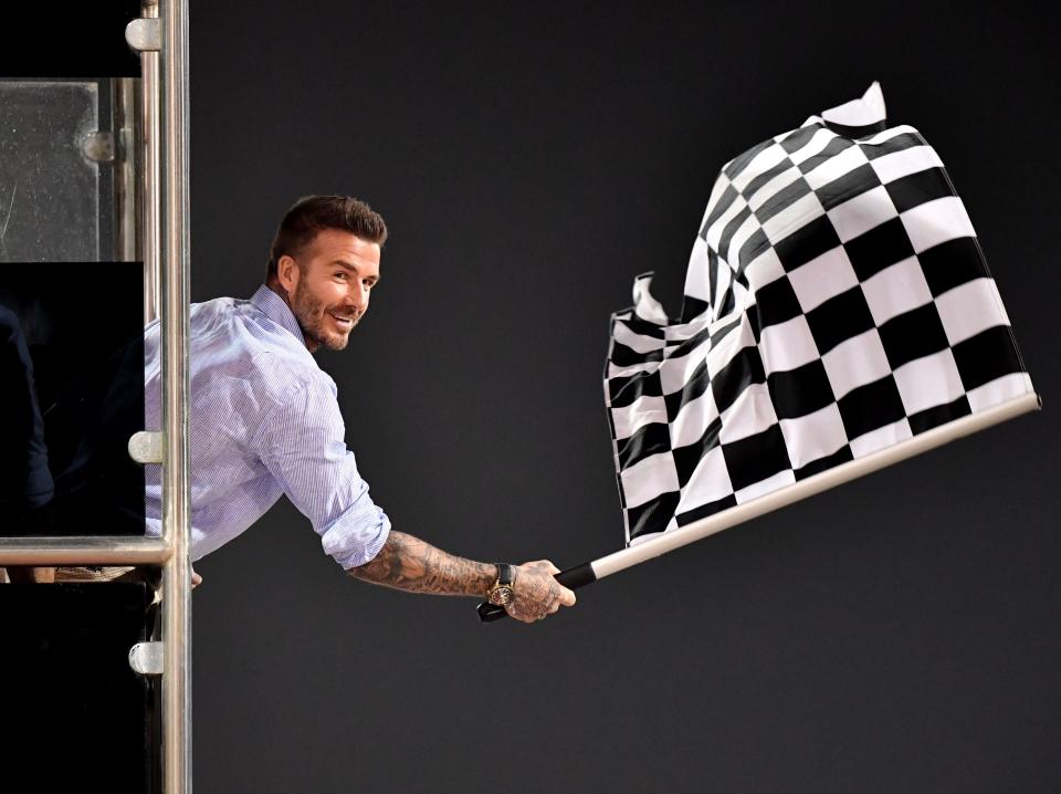 David Beckham waving flag.