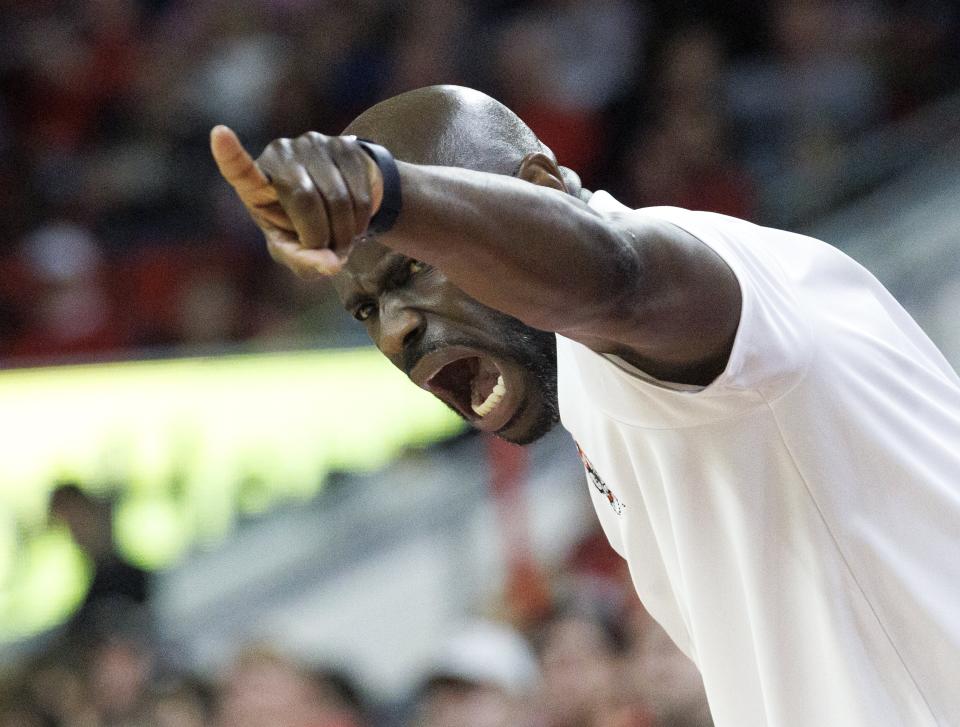 North Carolina State assistant coach Kareem Richardson gives instructions after coach Kevin Keatts was ejected, during the second half of the team's NCAA college basketball game against Wake Forest on Tuesday, Jan. 16, 2024, in Raleigh, N.C. (Kaitlin McKeown/The News & Observer via AP)