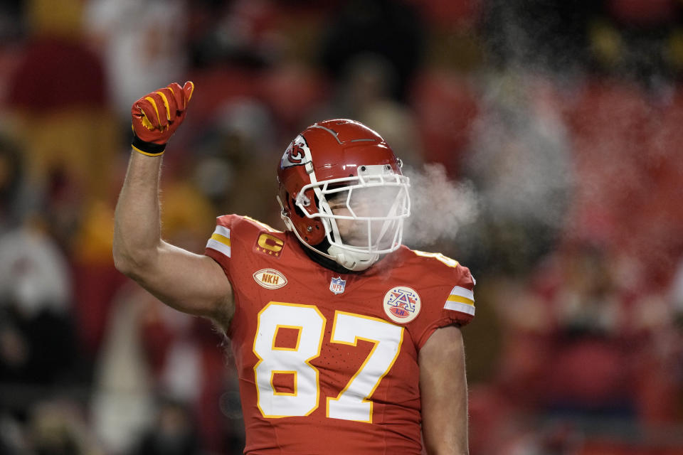 Kansas City Chiefs tight end Travis Kelce (87) warms up before an NFL wild-card playoff football game against the Miami Dolphins Saturday, Jan. 13, 2024, in Kansas City, Mo. (AP Photo/Charlie Riedel)