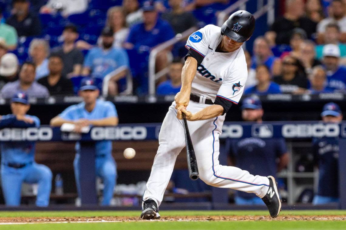 Miami Marlins batter Joey Wendle (18) swings at a pitch during the eighth inning of an MLB game against the Toronto Blue Jays at LoanDepot Park on Tuesday, June 20, 2023, in Miami, Florida.