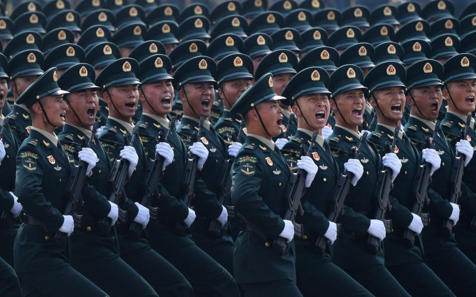 Chinese troops during a military parade in 2019 - Greg Baker/AFP