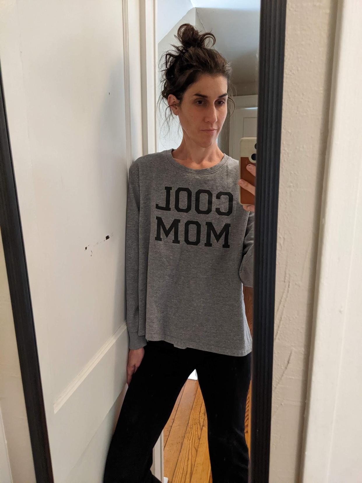 Abbey Roy scores a 'Cool Mom' shirt at the thrift store.
