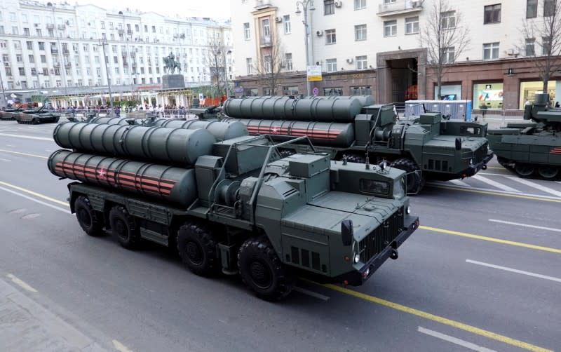 FILE PHOTO: Russian servicemen sit in the cabins of S-400 missile air defence systems before a parade marking the anniversary of victory over Nazi Germany in World War Two, in central Moscow, Russia