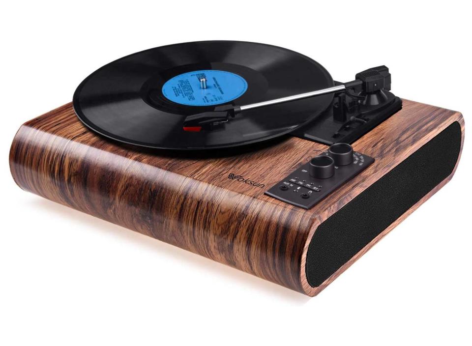 This mid-century modern record player would look great in the living room or dad's office. (Source: Amazon)