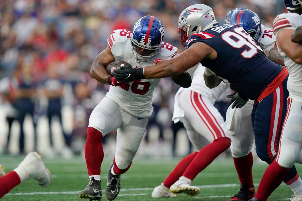 Will Saquon Barkley and the New York Giants beat the New England Patriots on Sunday? NFL Week 12 picks, predictions and odds weigh in on the game.