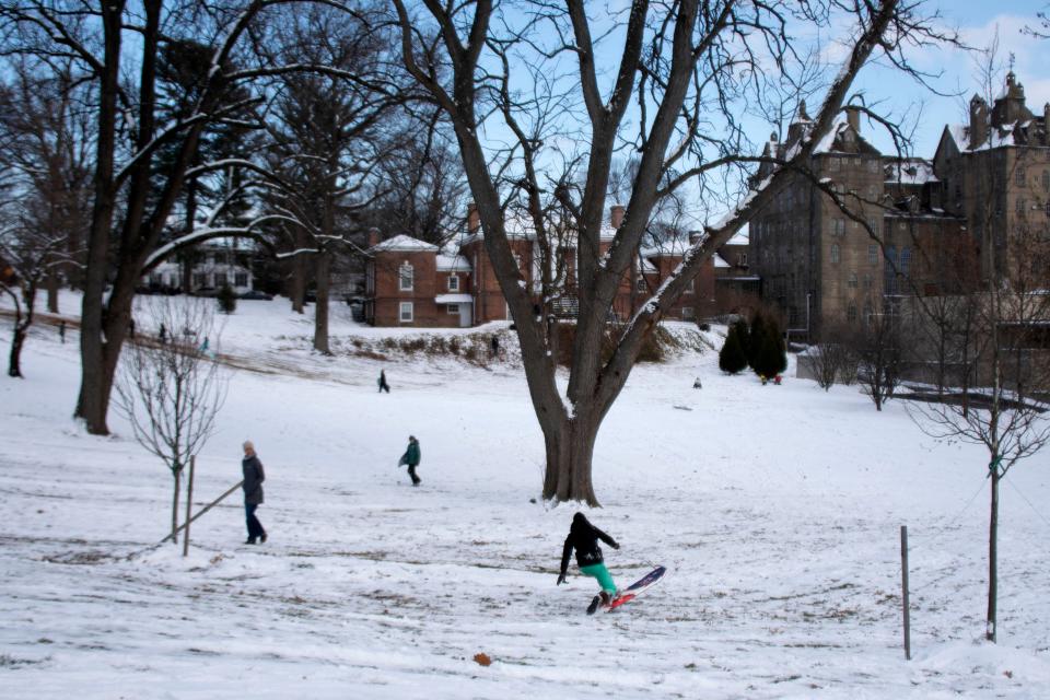 Kids enjoy sleding on Bucks County's first snow day of the season near Mercer Museum in Doylestown on Friday, Jan. 7, 2022.