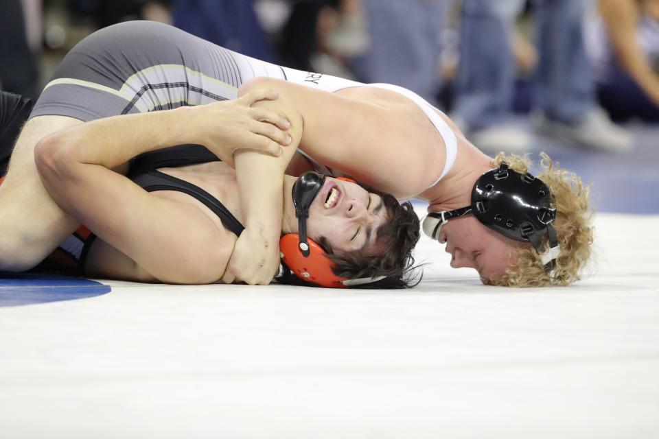 Gavin Montgomery of Salina wrestles Deacon Hendren of
Pawhuska in a Class 3A 150-pound semifinal match during the Oklahoma state wrestling tournament at State Fair Arena in Oklahoma City, Friday, Feb. 24, 2023.