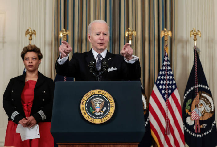 President Joe Biden speaks alongside Director of the Office of Management and Budget Shalanda Young as he introduces his budget request for fiscal year 2023 in the State Dining Room of the White House on March 28, 2022, in Washington, D.C. <span class="copyright">Anna Moneymaker/Getty Images</span>