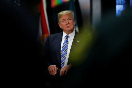 U.S. President Donald Trump meets with law enforcement at the Broward County Sheriff's Office in the wake of the shooting at Marjory Stoneman Douglas High School in Fort Lauderdale, Florida, U.S., February 16, 2018. REUTERS/Eric Thayer/Files