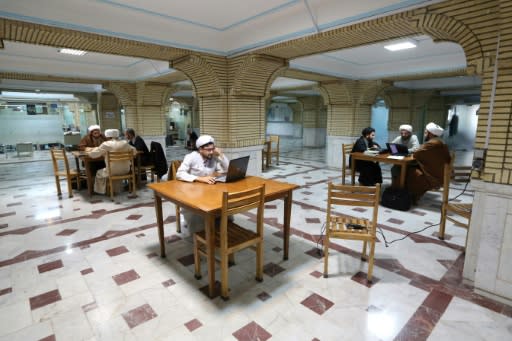 Muslim Shiite clerics study at the Imam Khomeini Education and Research Institute in the holy city of Qom