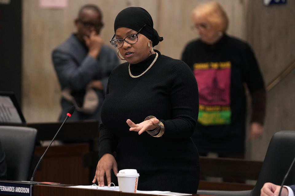 Boston City Councilor Tania Fernandes Anderson addresses Boston City Council members during a meeting at City Hall, in Boston, Wednesday, Oct. 25, 2023, as they debate the renaming of Faneuil Hall, a popular tourist site. (AP Photo/Steven Senne)