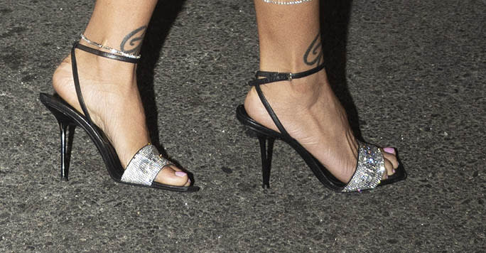 A closer look at Coi Leray’s black strappy rhinestone sandals. - Credit: Tim Regas / SplashNews.com