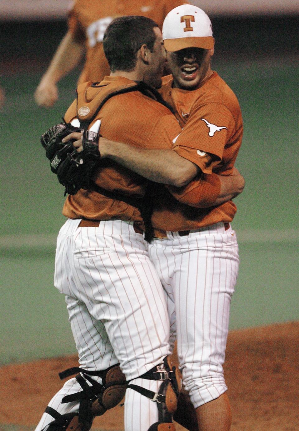 Texas pitcher Adrian Alaniz, right, gets a hug from catcher Taylor Teagarden after throwing a no-hitter against Oklahoma in 2005. Alaniz, now the head coach at Sinton, just led the Pirates to the Class 4A state championship on the same UFCU Disch-Falk Field.