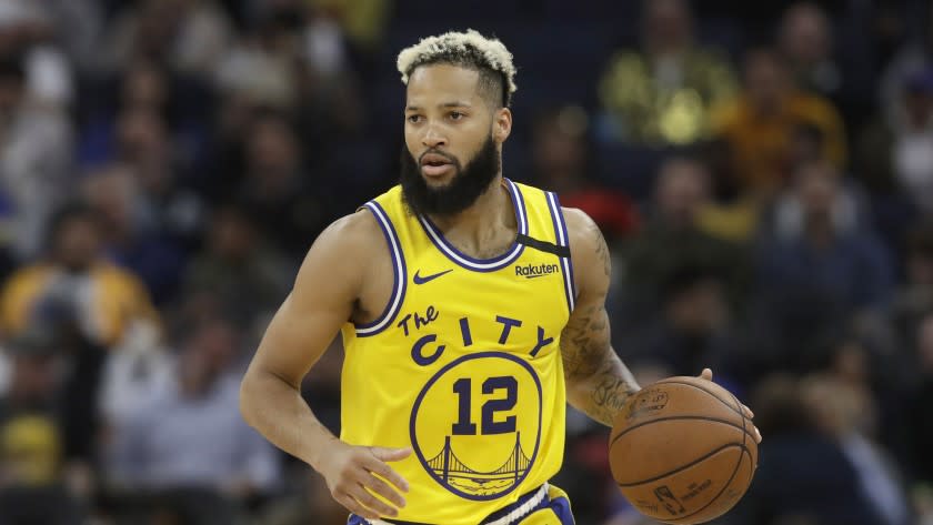 Golden State Warriors guard Ky Bowman (12) against the Los Angeles Lakers.