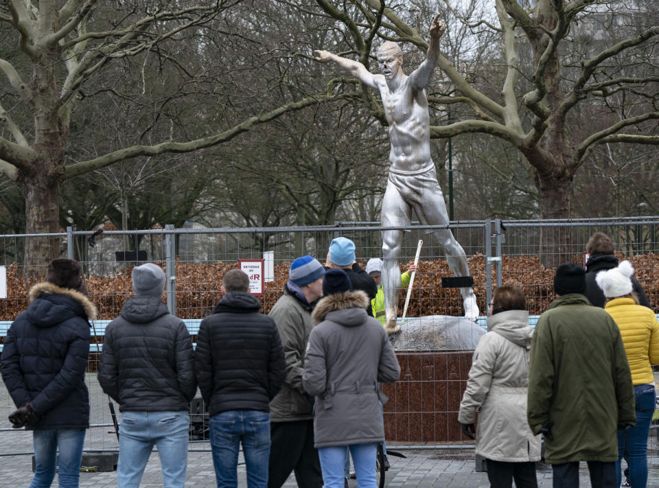 In this photo taken on Sunday, Dec. 22, 2019, the defaced statue of Zlatan Ibrahimovic is seen in Malmo, Sweden. The statue of Swedish soccer star Zlatan Ibrahimovic has been the target of more vandalism. This time, its nose has been chopped off. Ibrahimovic angered fans of his boyhood club, Malmo, last month when he bought a stake in one of its title rivals, Hammarby, and outlined his desire to make the Stockholm-based team “the best in Scandinavia.” (Johan Nilsson/TT News Agency via AP)