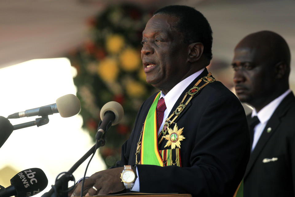 Zimbabwean President Emmerson Mnangagwa delivers his speech during his inauguration ceremony at the National Sports Stadium in Harare, Sunday, Aug. 26, 2018. Zimbabwe on Sunday inaugurated a president for the second time in nine months as a country recently jubilant over the fall of longtime leader Robert Mugabe is now largely subdued by renewed harassment of the opposition and a bitterly disputed election. (AP Photo/Tsvangirayi Mukwazhi)